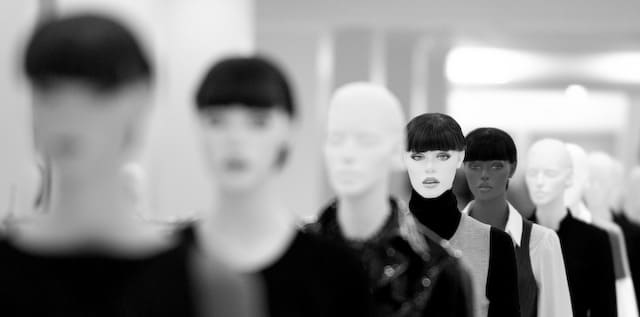 Mannequins lined up inside store (picture taken with Nikon D80 and Nikon AF-S 70-200mm f/2,8 G IF-ED VR)