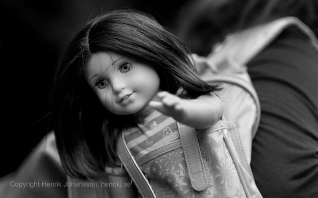 Doll is reaching out (picture taken with Canon EOS 5D Mark II and Canon EF 135mm F2 L USM )