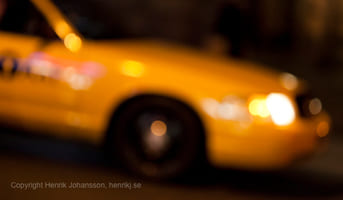 A blurry Yellow NYC cab